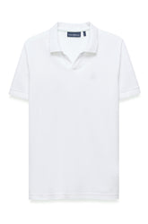 Polo blanc à manches courtes avec col côtelé, patte ouverte et logo ton sur ton à la poitrine pour homme par Psycho Bunny