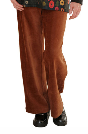 Rien ne se perd, tout se crée women's angled front view of rust brown corduroy wide-leg pants with vertical ribbed texture