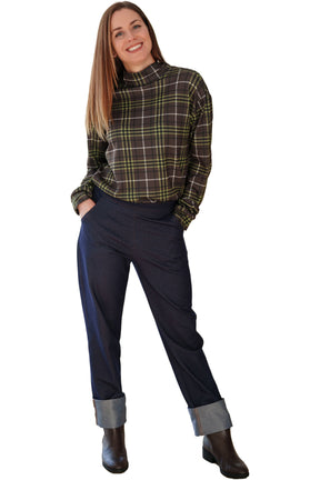 Rien ne se perd, tout se crée women's dark indigo pants with slash pockets and wide light rolled cuffs, front model view