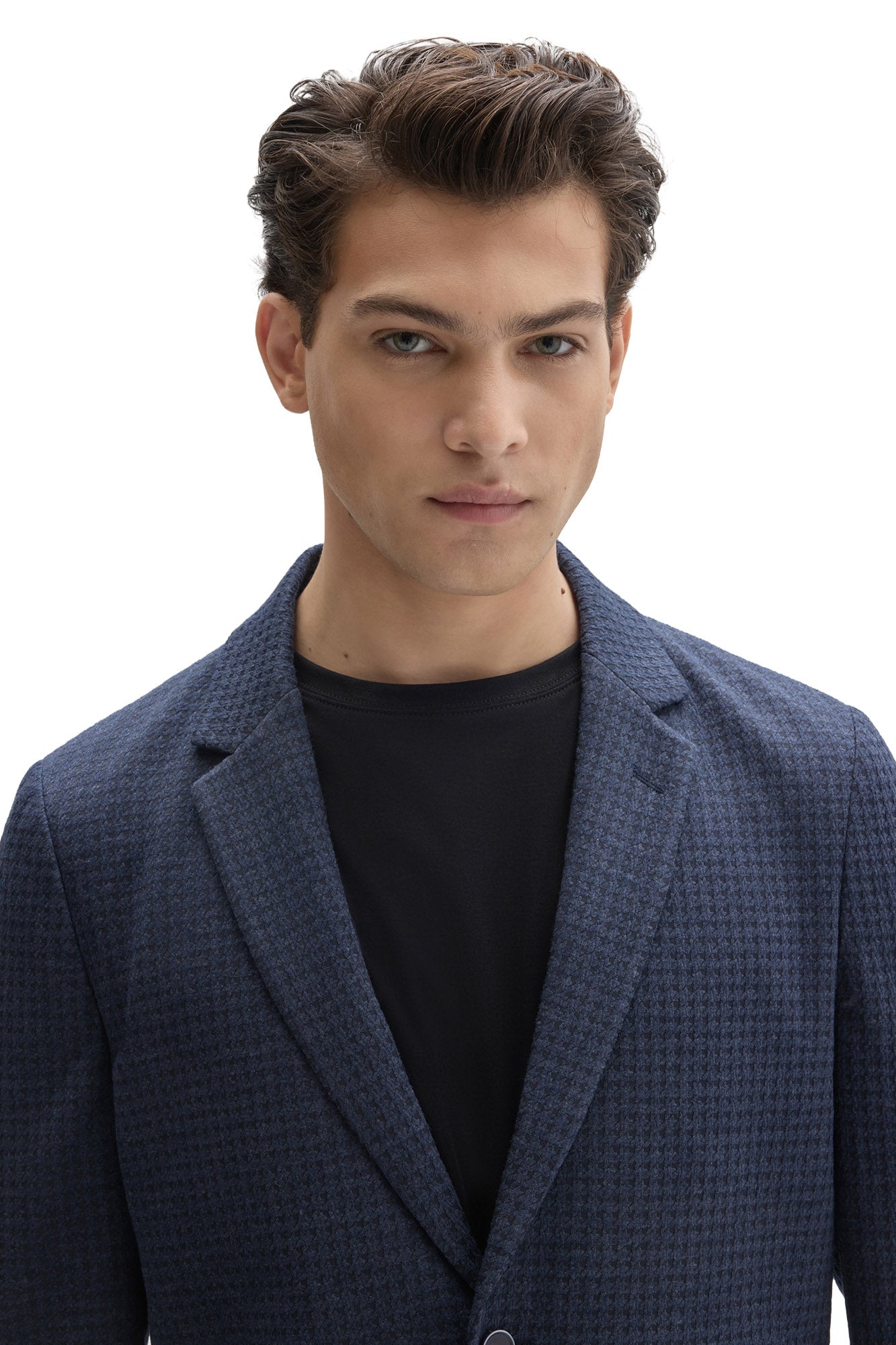 Men's close front detail of navy textured sport blazer showing notched lapels and subtle check texture by Robert Barakett