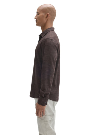 Robert Barakett men's dark brown long sleeve button-up shirt showing collar, shoulder seam and cuff button, side view