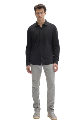 Robert Barakett men's full-body front view of black knit long sleeve shirt with ribbed collar and button front