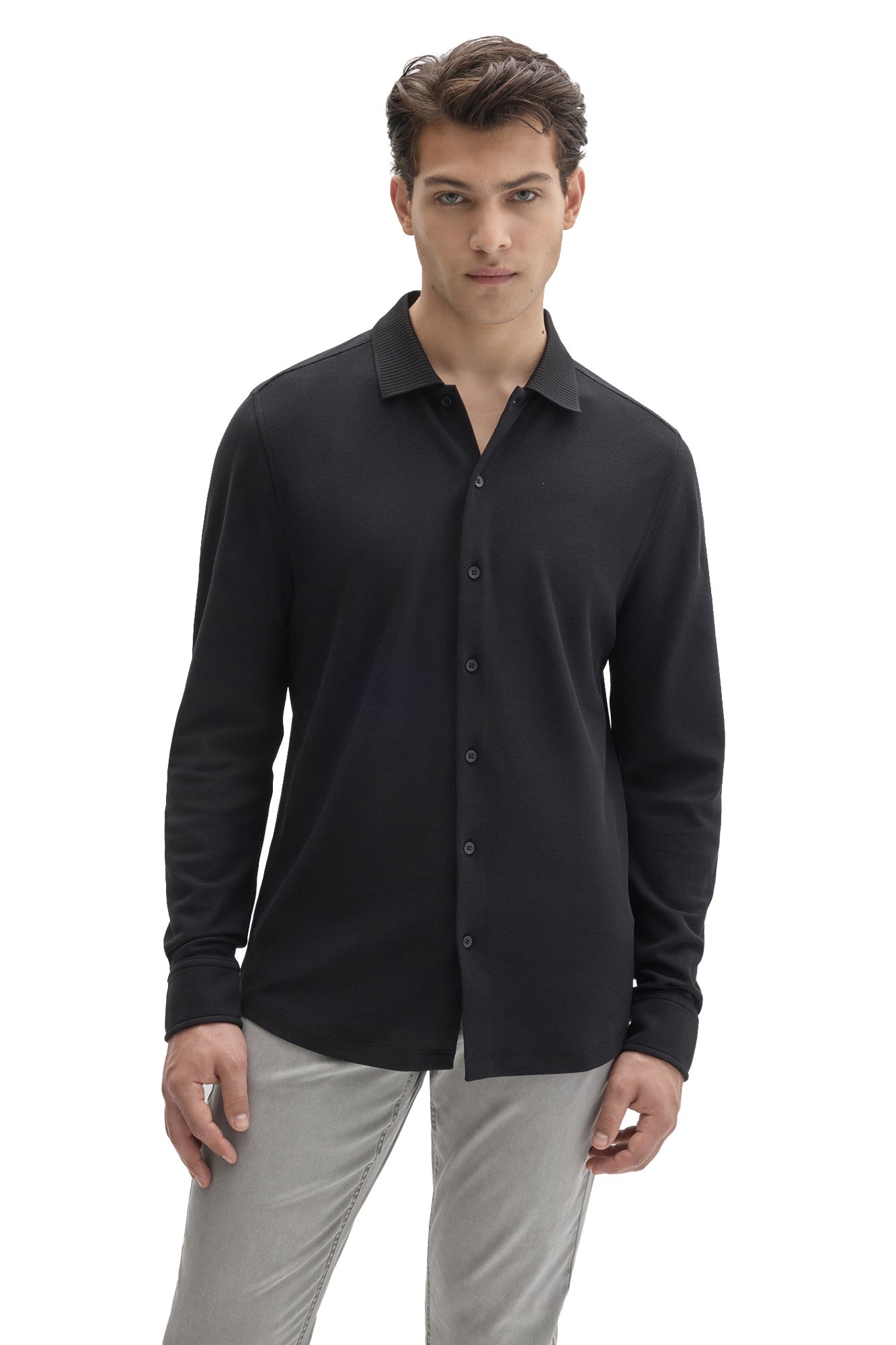 Front view of men's black knit long sleeve shirt with ribbed collar and full button closure by Robert Barakett