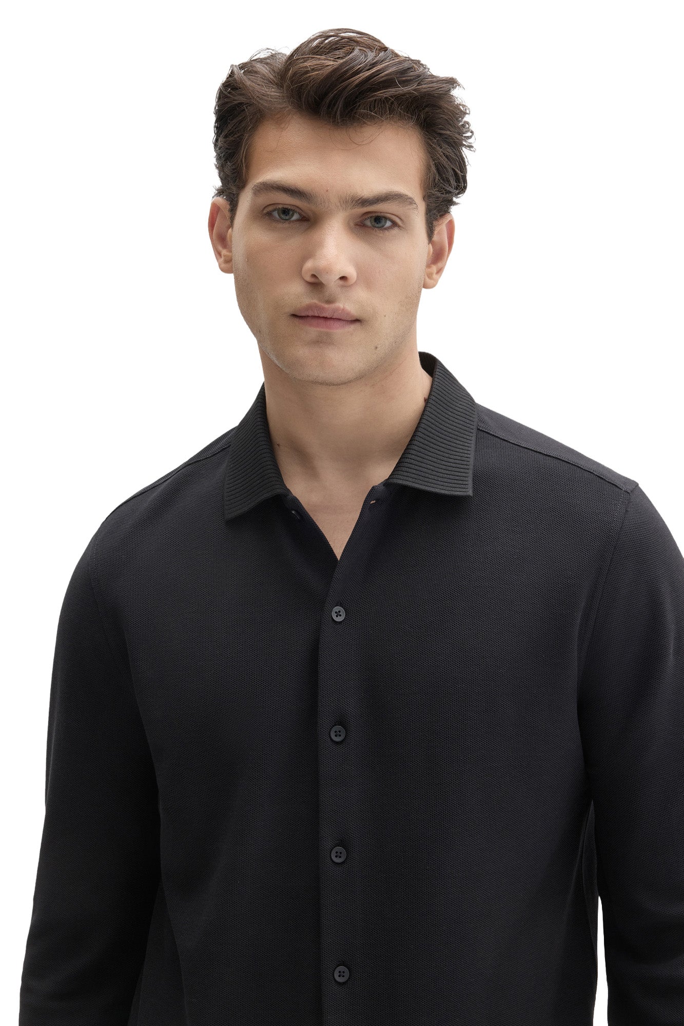 Men's close front view of black knit long-sleeve shirt with ribbed collar and tonal button front by Robert Barakett