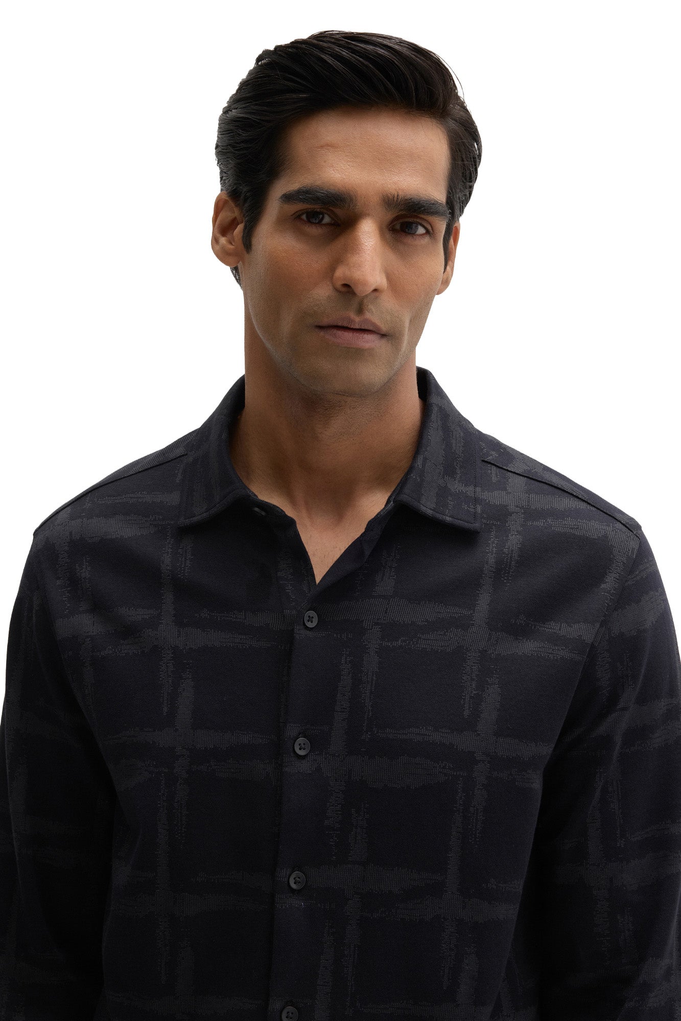 Men's close front view of dark navy knit long-sleeve shirt showing spread collar and buttons by Robert Barakett