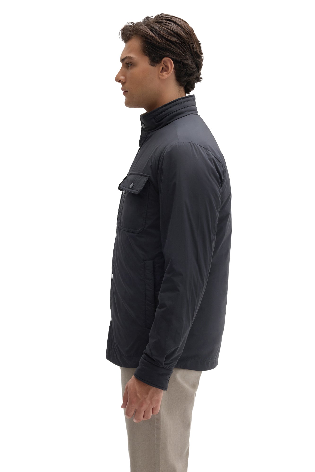 Robert Barakett men's navy snap jacket with stand collar, chest flap pocket, and side hand pocket shown from the side