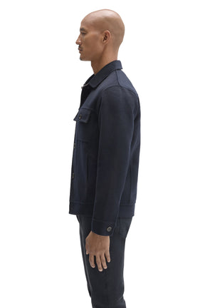 Robert Barakett men's dark navy button-front jacket with chest flap pocket, long sleeve, and button cuff shown from the side