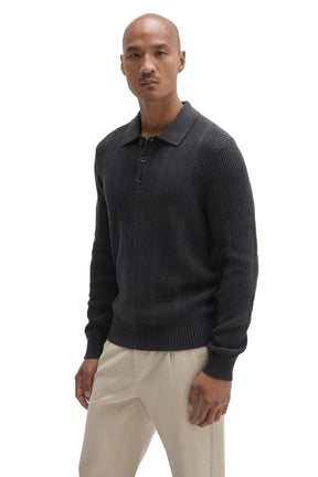Men's front angled view of charcoal knit long-sleeve polo with flat collar and three buttons by Robert Barakett