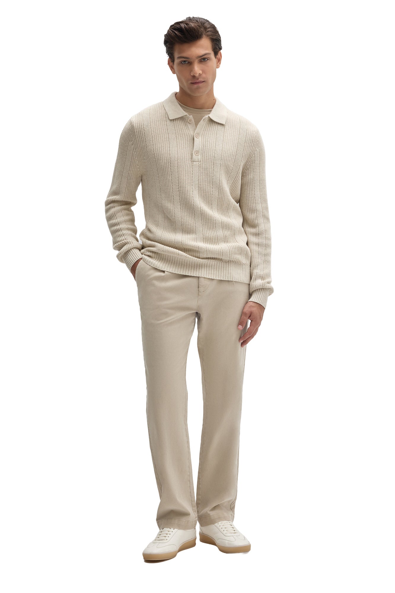 Men's full front view of a cream textured knit long-sleeve polo with, ribbed hem, and button placket by Robert Barakett