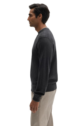 Robert Barakett men's charcoal long sleeve knit sweater showing the straight fit and ribbed hem, side view