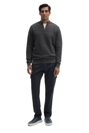 Men's full-length front view of charcoal textured knit half-zip long-sleeve knit sweater worn by Robert Barakett