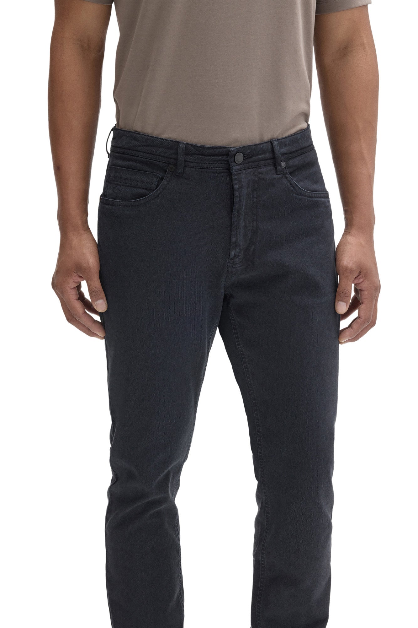 Men's close front view of washed black straight-leg jeans with button waistband and fly front by Robert Barakett