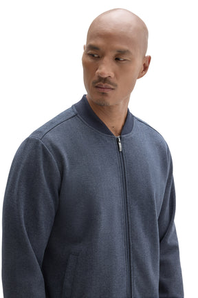 Robert Barakett men's blue zip jacket with ribbed baseball collar and subtle herringbone-like texture, close-up