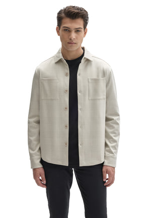 Robert Barakett men's cream tonal plaid overshirt worn open, with button placket and two chest patch pockets, front view