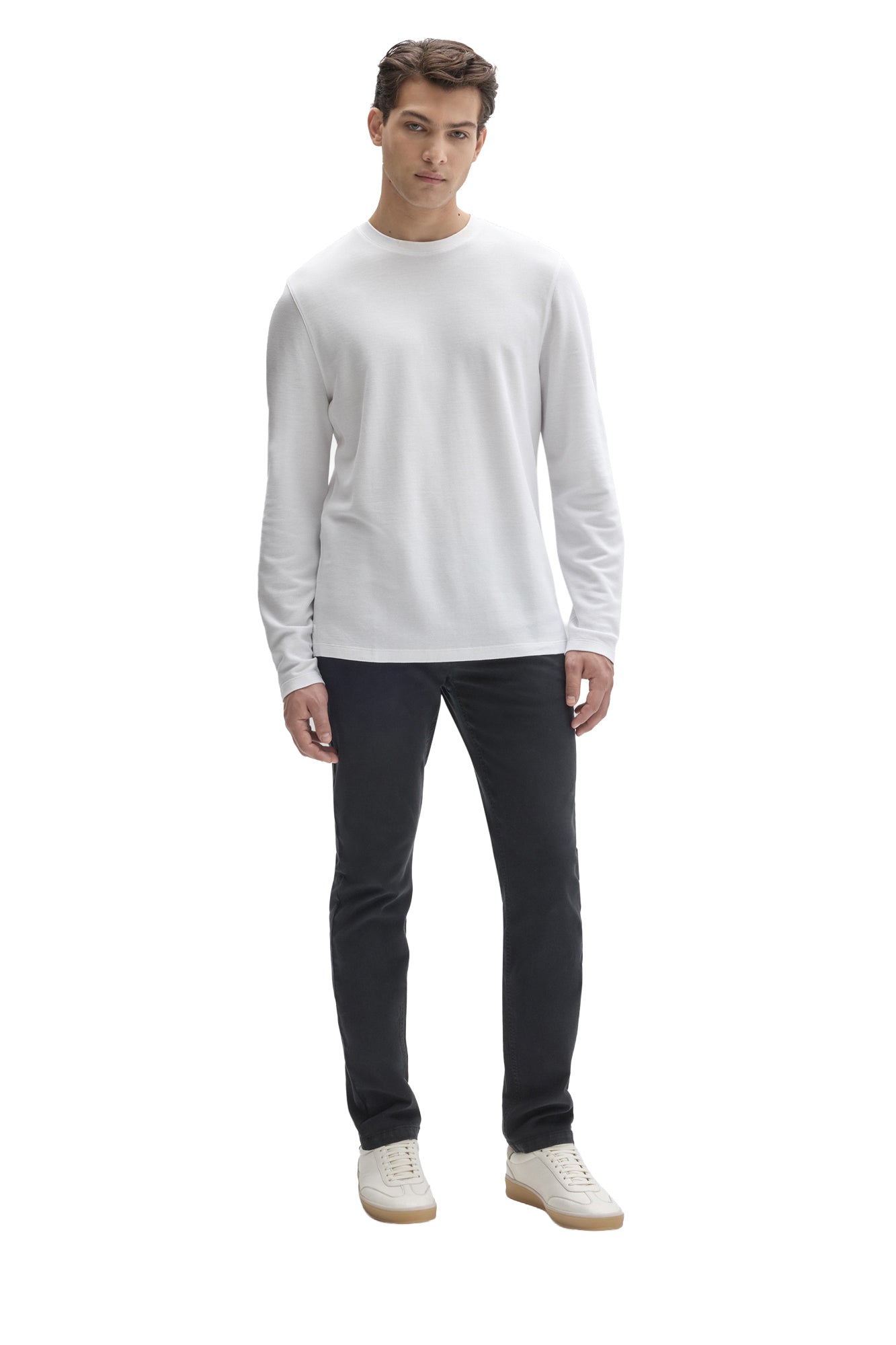 Men's full front view of white long sleeve crew neck T-Shirt styled with dark pants by Robert Barakett