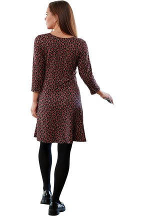 Rien ne se perd, tout se crée women's black floral dress back view with three-quarter sleeves and rounded neckline