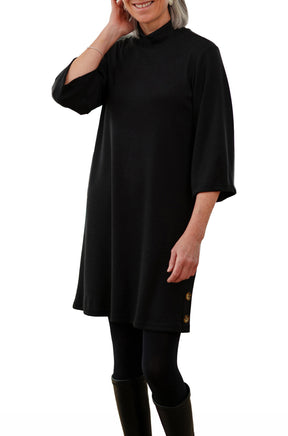 Rien ne se perd, tout se crée women's angled view of a black mock-neck dress with three-quarter sleeves, side view
