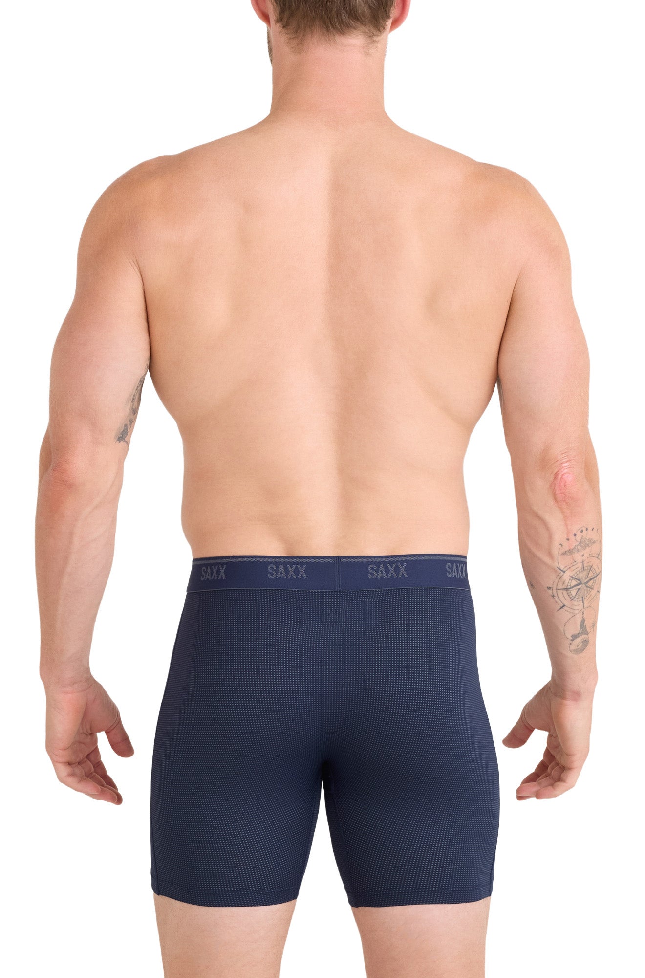 Men's navy boxer briefs with micro-dot texture and repeated SAXX waistband logos shown from the back