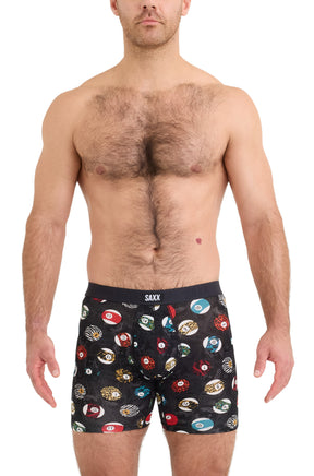 Men's black boxer briefs with SAXX waistband and colorful numbered ball print, front model view