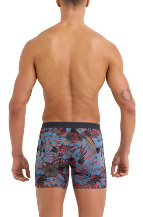 Vue arrière sur modèle du sous-vêtement rouge tropical avec taille noire et ourlets droits pour homme par Saxx