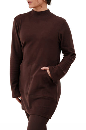 Rien ne se perd, tout se crée women's angled view of dark brown mock neck tunic showing front pocket opening, side view