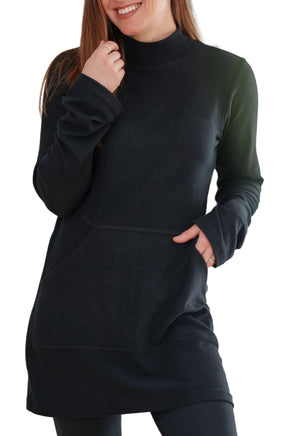 Women's closer front view of black mock-neck tunic with long sleeves and front seam pockets by Rien ne se perd, tout se crée