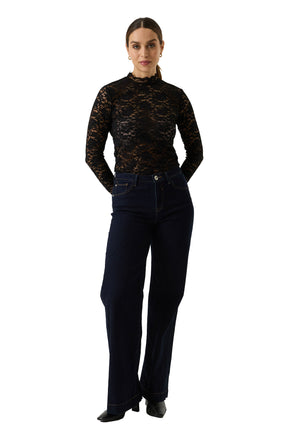 Women's black floral lace long sleeve blouse on model, full front view with high scalloped neck by Garcia