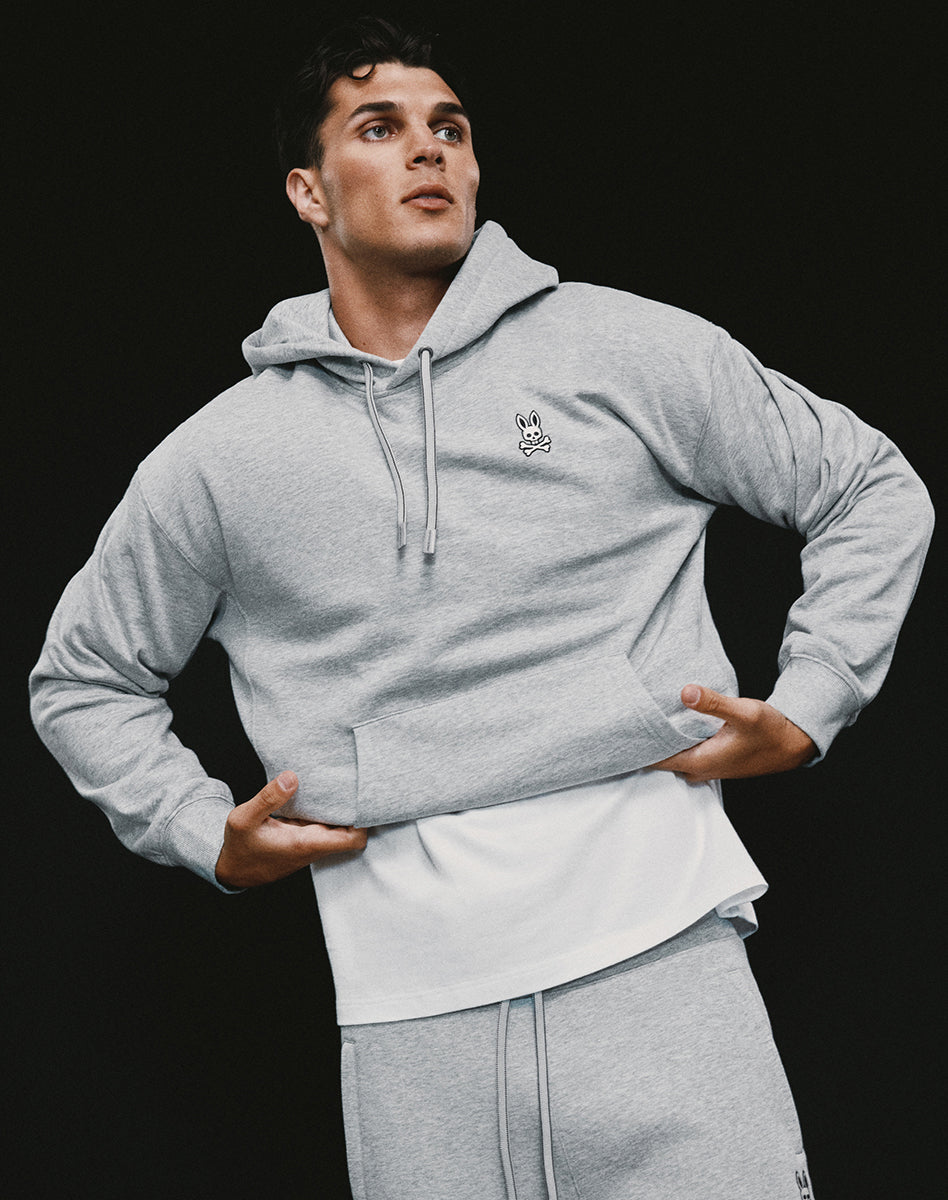 Grey Psycho Bunny Hoodie with embroidered bunny logo, paired with matching pants for a casual men’s look.